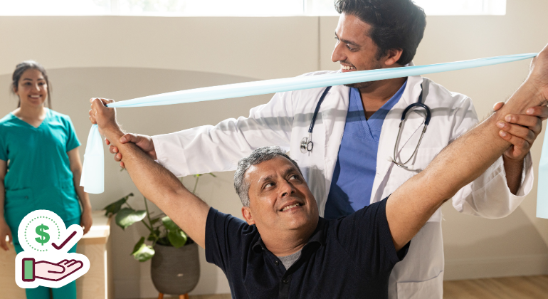 Physiotherapist guiding a male patient through shoulder stretching exercises with a resistance band during a rehabilitation session.